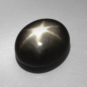 27.17캐럿 천연 검정색 스타 사파이어, 타원형 컷, 17.9×14.7 mm, 불투명체