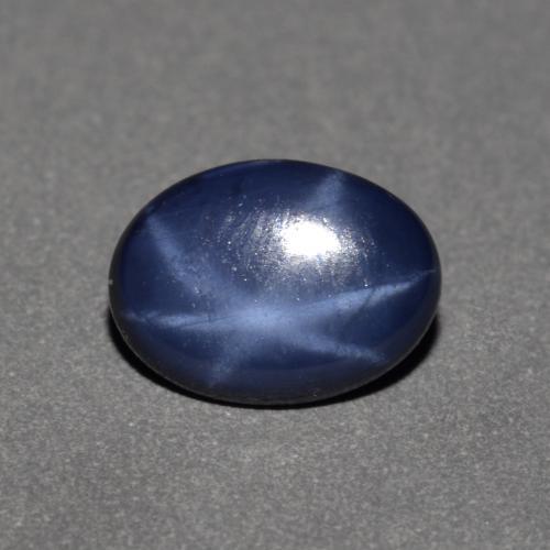 0.90캐럿 천연 트와일라잇 블루 스타 사파이어, 타원형 컷, 7×5.2 mm, 불투명체