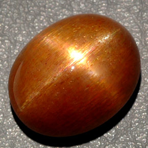 27.65캐럿 천연 골든 브라운 스타 선스톤, 타원형 컷, 20.4×16.4 mm, 불투명체