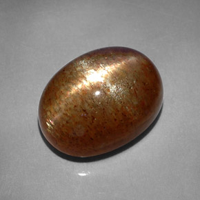 8.41캐럿 천연 골든 브라운 스타 선스톤, 타원형 컷, 13.9×10.5 mm, 불투명체