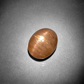 5.57캐럿 천연 골든 브라운 스타 썬스톤, 타원형 컷, 불투명체