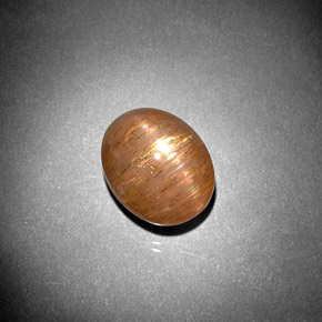 5.57캐럿 천연 골든 브라운 스타 썬스톤, 타원형 컷, 불투명체