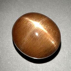 6.93캐럿 천연 골든 브라운 스타 썬스톤, 타원형 컷, 불투명체