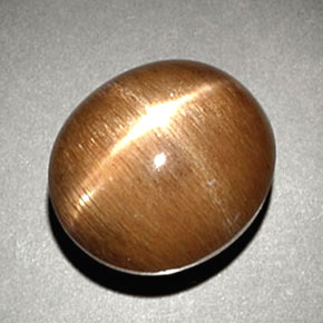 6.93캐럿 천연 골든 브라운 스타 썬스톤, 타원형 컷, 불투명체