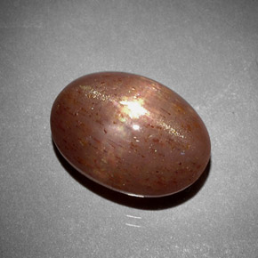 6.85캐럿 천연 골든 브라운 스타 썬스톤, 타원형 컷, 불투명체