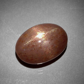 6.85캐럿 천연 골든 브라운 스타 썬스톤, 타원형 컷, 불투명체