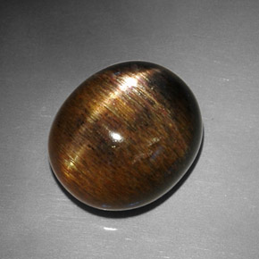 12.68캐럿 천연 골든 브라운 스타 선스톤, 타원형 컷, 15.6×13.4 mm, 불투명체