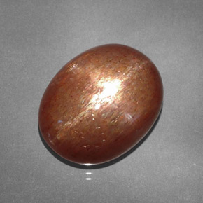 15.61캐럿 천연 골든 브라운 스타 선스톤, 타원형 컷, 18.1×14.5 mm, 불투명체