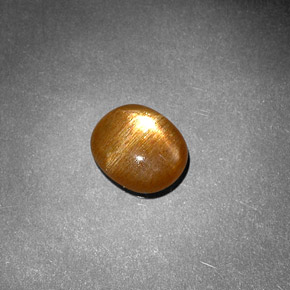 1.18캐럿 천연 골든 브라운 스타 선스톤, 타원형 컷, 8.5×7.2 mm, 불투명체