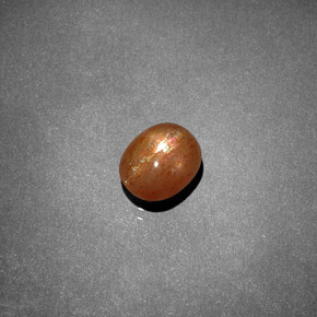 1.19캐럿 천연 골든 브라운 스타 썬스톤, 타원형 컷, 불투명체