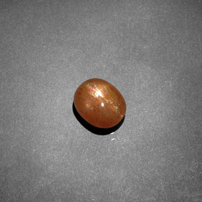 1.19캐럿 천연 골든 브라운 스타 썬스톤, 타원형 컷, 불투명체