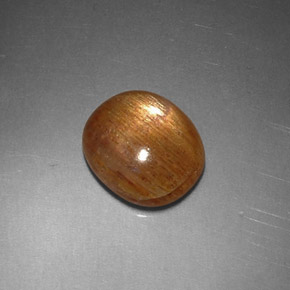 1.62캐럿 천연 골든 브라운 스타 선스톤, 타원형 컷, 8.6×7.5 mm, 불투명체