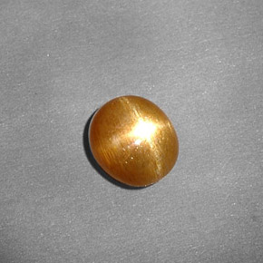 0.80캐럿 천연 골든 브라운 스타 선스톤, 타원형 컷, 6.7×6 mm, 불투명체