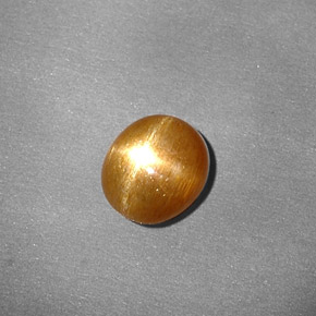 0.80캐럿 천연 골든 브라운 스타 선스톤, 타원형 컷, 6.7×6 mm, 불투명체