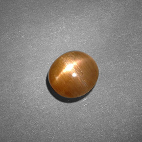 0.91캐럿 천연 골든 브라운 스타 선스톤, 타원형 컷, 6.4×6 mm, 불투명체