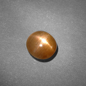 0.91캐럿 천연 골든 브라운 스타 선스톤, 타원형 컷, 6.4×6 mm, 불투명체