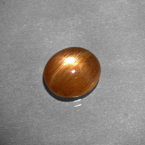 1.34캐럿 천연 골든 브라운 스타 썬스톤, 타원형 컷, 불투명체