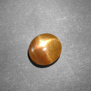 0.99캐럿 천연 골든 브라운 스타 선스톤, 타원형 컷, 7.3×6.7 mm, 불투명체