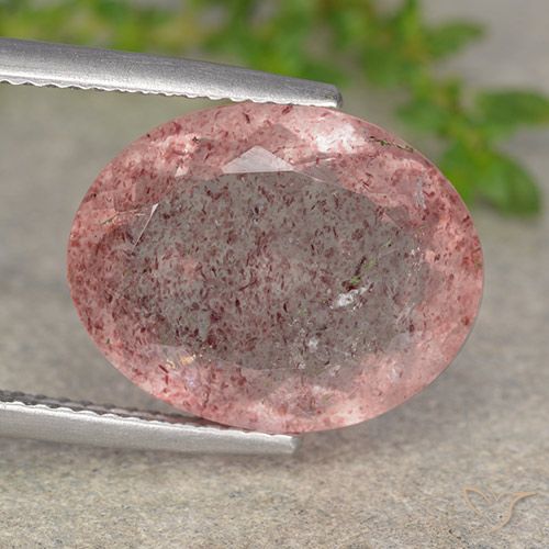 8.27ct 자연스러운 오렌지 핑크 딸기 석영, 타원형, 투명한