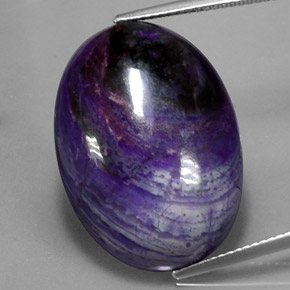 27.34캐럿 천연 멀티컬러 수길라이트, 타원형 컷, 25.3×18.3 mm, 불투명체