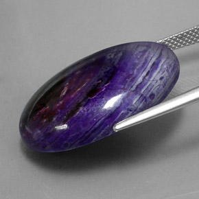 27.34캐럿 천연 멀티컬러 수길라이트, 타원형 컷, 25.3×18.3 mm, 불투명체