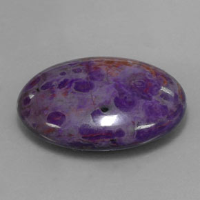21.13캐럿 천연 멀티컬러 수길라이트, 타원형 컷, 25.3×18.3 mm, 불투명체