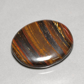53.09캐럿 천연 멀티컬러 Tiger's Eye Matrix, 타원형 컷, 31×26.7 mm, 불투명체