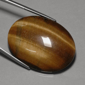 75.77캐럿 천연 골드 브라운 Tiger's Eye, 타원형 컷, 40×29.9 mm, 불투명체