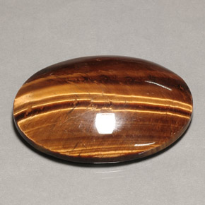74.22캐럿 천연 골드 브라운 Tiger's Eye, 타원형 컷, 39.9×30 mm, 불투명체