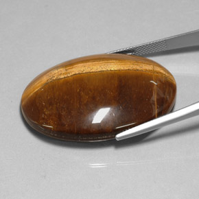 78.13캐럿 천연 골드 브라운 Tiger's Eye, 타원형 컷, 40×30.1 mm, 불투명체