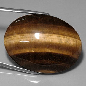 76.52캐럿 천연 골드 브라운 Tiger's Eye, 타원형 컷, 39.9×29.9 mm, 불투명체