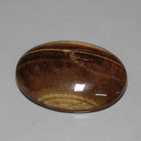 80.28캐럿 천연 골드 브라운 Tiger's Eye, 타원형 컷, 40×29.9 mm, 불투명체