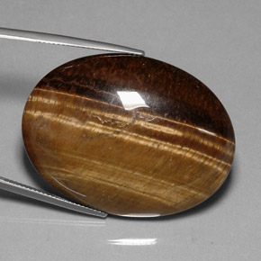 80.28캐럿 천연 골드 브라운 Tiger's Eye, 타원형 컷, 40×29.9 mm, 불투명체