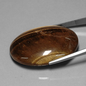 80.28캐럿 천연 골드 브라운 Tiger's Eye, 타원형 컷, 40×29.9 mm, 불투명체