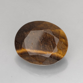 25.78캐럿 천연 골드 브라운 Tiger's Eye, 타원형 컷, 21.4×17.5 mm, 불투명체
