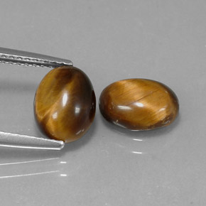 1.59캐럿 천연 골드 브라운 Tiger's Eye, 타원형 컷, 8.7×6.8 mm, 불투명체