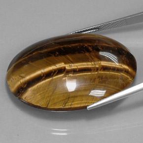 73.05캐럿 천연 골드 브라운 Tiger's Eye, 타원형 컷, 39.8×24.1 mm, 불투명체