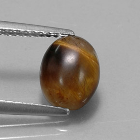 1.55캐럿 천연 골드 브라운 Tiger's Eye, 타원형 컷, 8.8×6.8 mm, 불투명체