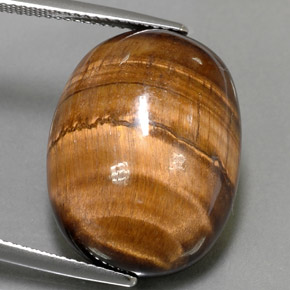 24.80캐럿 천연 골드 브라운 Tiger's Eye, 타원형 컷, 21.7×16.8 mm, 불투명체