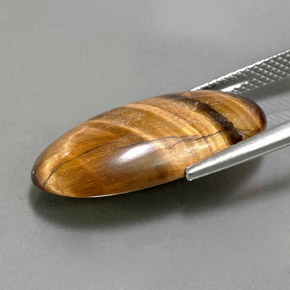 11.79캐럿 천연 골드 브라운 Tiger's Eye, 타원형 컷, 23.3×12.2 mm, 불투명체