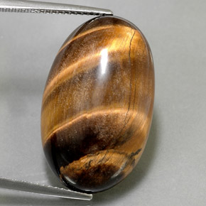 26.13캐럿 천연 골드 브라운 Tiger's Eye, 타원형 컷, 24.8×15.3 mm, 불투명체