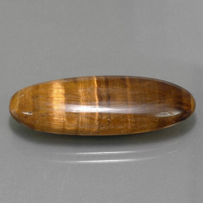 18.16캐럿 천연 골드 브라운 Tiger's Eye, 타원형 컷, 31.5×12.1 mm, 불투명체