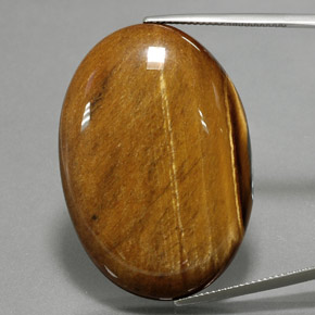 68.47캐럿 천연 골드 브라운 Tiger's Eye, 타원형 컷, 39.2×27.1 mm, 불투명체