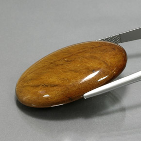 68.47캐럿 천연 골드 브라운 Tiger's Eye, 타원형 컷, 39.2×27.1 mm, 불투명체