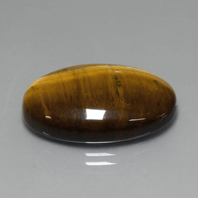 19.40캐럿 천연 미디엄 라이트 브라운 Tiger's Eye, 타원형 컷, 24.7×16.6 mm, 불투명체