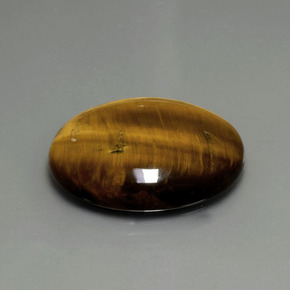 22.43캐럿 천연 골드 브라운 Tiger's Eye, 타원형 컷, 25.2×20.3 mm, 불투명체