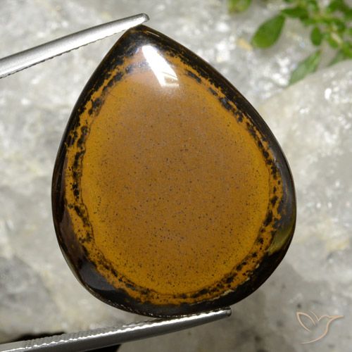 30.34ct 자연스러운 갈색 호랑이의 눈, 배 모양, 불투명체