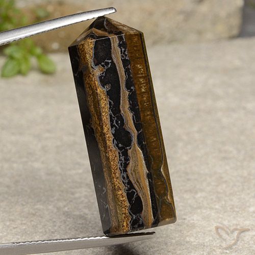 32.91캐럿 천연 웜 브라운 호랑이의 눈, 멋진 모양, 불투명체