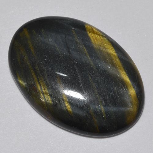 9.44캐럿 천연 멀티컬러 Tiger's Eye, 타원형 컷, 20.6×14.4 mm, 불투명체