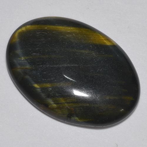 9.44캐럿 천연 멀티컬러 Tiger's Eye, 타원형 컷, 20.6×14.4 mm, 불투명체